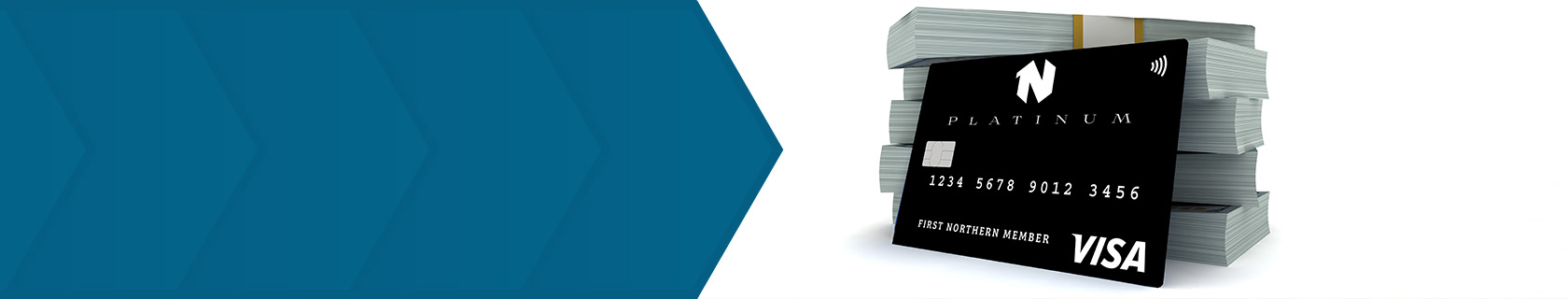 stack of money with credit card