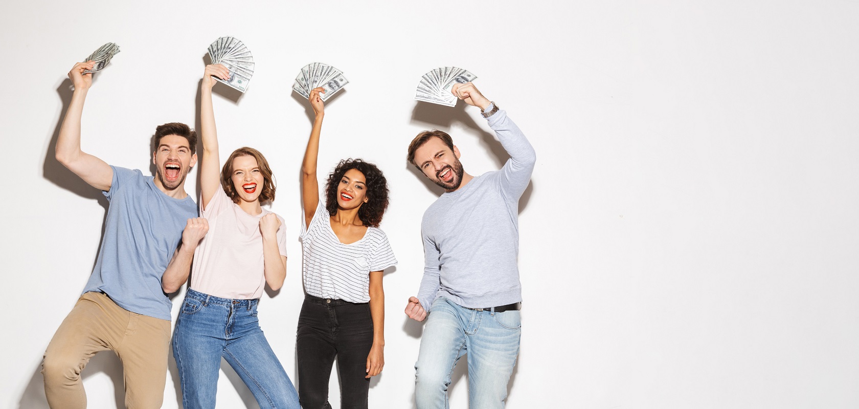 group of friends standing together, smiling, holding money