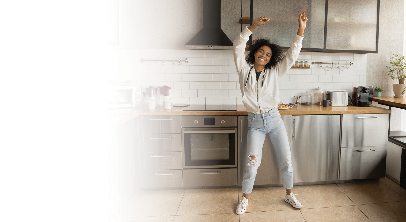 woman dancing in kitchen